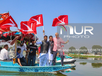 Omar Abdullah, the leader of Jammu and Kashmir National Conference (JKNC), right, Tanvir Sadiq, candidate of Jammu and Kashmir National Conf...