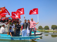 Omar Abdullah, the leader of Jammu and Kashmir National Conference (JKNC), right, Tanvir Sadiq, candidate of Jammu and Kashmir National Conf...