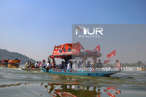 Omar Abdullah, the leader of Jammu and Kashmir National Conference (JKNC), right, during an election rally at Dal Lake, ahead of the second...