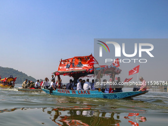 Omar Abdullah, the leader of Jammu and Kashmir National Conference (JKNC), right, during an election rally at Dal Lake, ahead of the second...