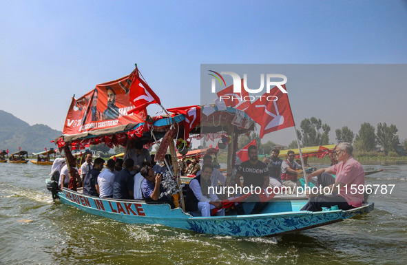 Omar Abdullah, the leader of Jammu and Kashmir National Conference (JKNC), right, during an election rally at Dal Lake, ahead of the second...