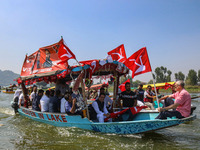 Omar Abdullah, the leader of Jammu and Kashmir National Conference (JKNC), right, during an election rally at Dal Lake, ahead of the second...