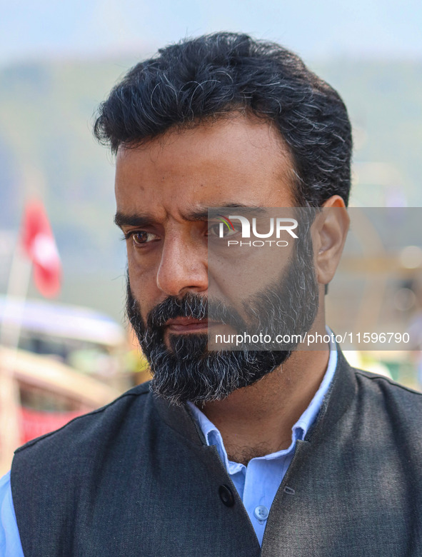 Member of Parliament and National Conference (NC) leader Aga Syed Ruhullah Mehdi looks on during an election rally at Dal Lake, ahead of the...