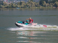 Former chief minister of Jammu and Kashmir and the leader of Jammu and Kashmir National Conference (JKNC) Omar Abdullah rides a jet ski duri...