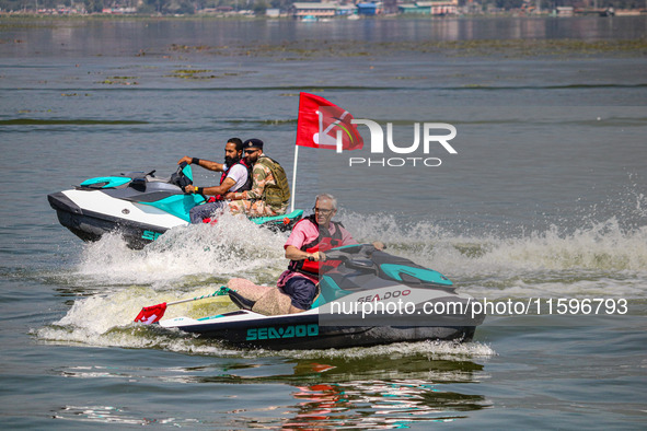 Former chief minister of Jammu and Kashmir and the leader of Jammu and Kashmir National Conference (JKNC) Omar Abdullah rides a jet ski duri...