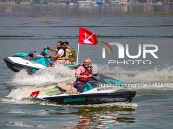 Former chief minister of Jammu and Kashmir and the leader of Jammu and Kashmir National Conference (JKNC) Omar Abdullah rides a jet ski duri...