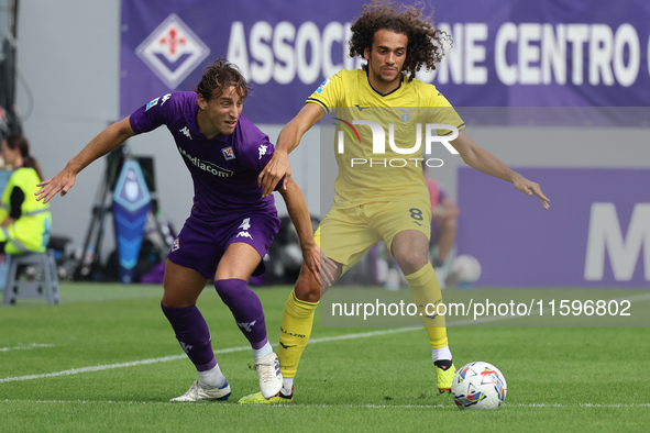 Edoardo Bove of ACF Fiorentina and Matteo Guendouzi of SS Lazio ,battle for the ball during the Italian Serie A football match between ACF F...