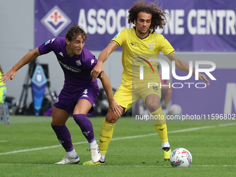 Edoardo Bove of ACF Fiorentina and Matteo Guendouzi of SS Lazio ,battle for the ball during the Italian Serie A football match between ACF F...