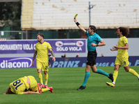 Referee Matteo Marcenaro shows Yellow to Cristiano Biraghi of ACF Fiorentina duringthe Italian Serie A football match between ACF Fiorentina...