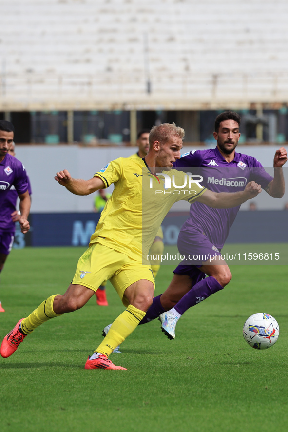 Gustav Isaksen of ACF Fiorentina and NOME of SS Lazio ,battle for the ball during the Italian Serie A football match between ACF Fiorentina...