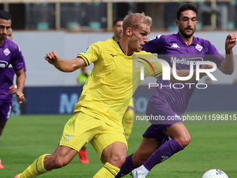 Gustav Isaksen of ACF Fiorentina and NOME of SS Lazio ,battle for the ball during the Italian Serie A football match between ACF Fiorentina...