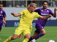 Gustav Isaksen of ACF Fiorentina and NOME of SS Lazio ,battle for the ball during the Italian Serie A football match between ACF Fiorentina...