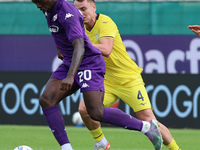 Moise Kean of ACF Fiorentina and Patric of SS Lazio ,battle for the ball during the Italian Serie A football match between ACF Fiorentina an...