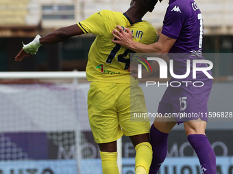 Pietro Comuzzo of ACF Fiorentina and Tijjani Noslin of SS Lazio ,battle for the ball during the Italian Serie A football match between ACF F...