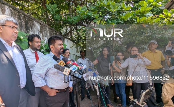 Sri Lanka's presidential candidate of National People's Power (NPP), Anura Kumara Dissanayake, speaks to the press after casting his vote at...