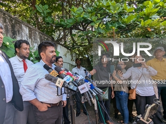 Sri Lanka's presidential candidate of National People's Power (NPP), Anura Kumara Dissanayake, speaks to the press after casting his vote at...