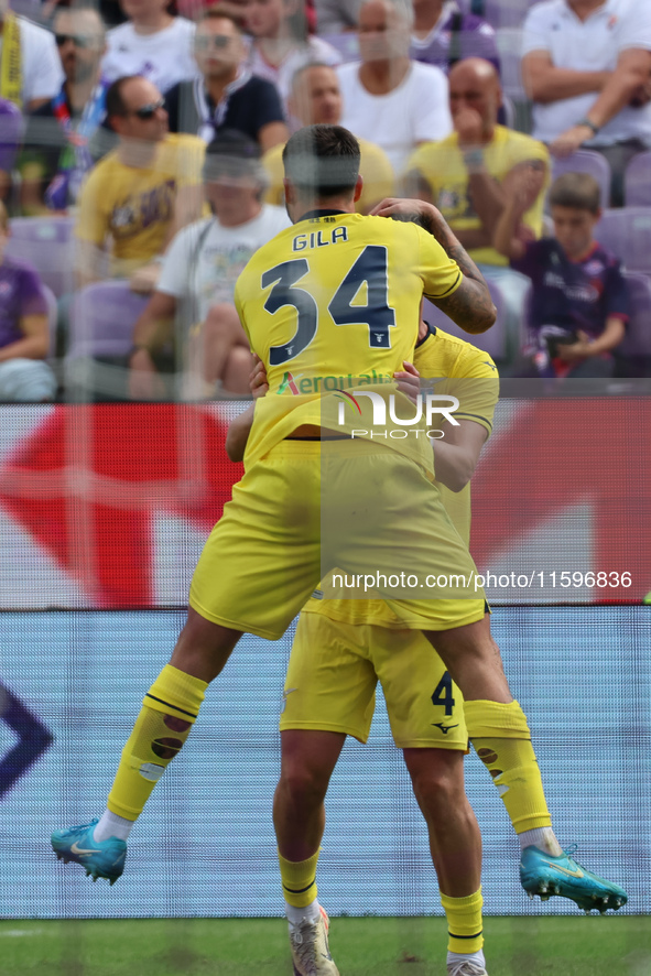 Mario Gila of SS Lazio celebrates with teammates after scoring  goal during  the Italian Serie A football match between ACF Fiorentina and S...