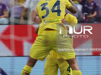 Mario Gila of SS Lazio celebrates with teammates after scoring  goal during  the Italian Serie A football match between ACF Fiorentina and S...