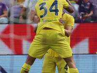 Mario Gila of SS Lazio celebrates with teammates after scoring  goal during  the Italian Serie A football match between ACF Fiorentina and S...