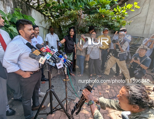 Sri Lanka's presidential candidate of National People's Power (NPP), Anura Kumara Dissanayake, speaks to the press after casting his vote at...