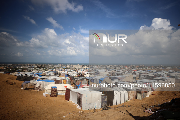 Displaced Palestinians shelter in a tent camp amid the Israel-Hamas conflict in the Al-Mawasi area in Khan Yunis in the southern Gaza Strip...