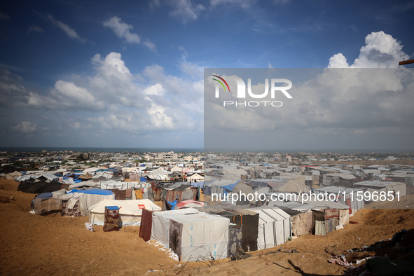 Displaced Palestinians shelter in a tent camp amid the Israel-Hamas conflict in the Al-Mawasi area in Khan Yunis in the southern Gaza Strip...