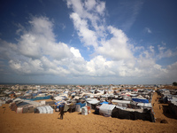 Displaced Palestinians shelter in a tent camp amid the Israel-Hamas conflict in the Al-Mawasi area in Khan Yunis in the southern Gaza Strip...