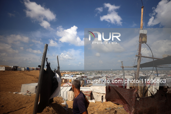 Displaced Palestinians shelter in a tent camp amid the Israel-Hamas conflict in the Al-Mawasi area in Khan Yunis in the southern Gaza Strip...