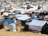 Displaced Palestinians shelter in a tent camp amid the Israel-Hamas conflict in the Al-Mawasi area in Khan Yunis in the southern Gaza Strip...