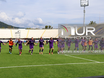 ACF Fiorentina players greet the curve of its fans after the victory between the Italian Serie A football match between ACF Fiorentina and S...