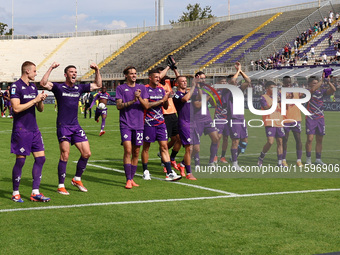 ACF Fiorentina players greet the curve of its fans after the victory between the Italian Serie A football match between ACF Fiorentina and S...