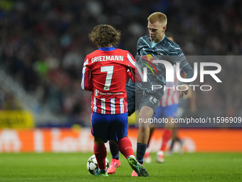 Arthur Vermeeren central midfield of RB Leipzig and Belgium and Antoine Griezmann second striker of Atletico de Madrid and France compete fo...