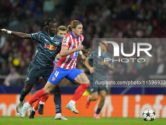 Conor Gallagher central midfield of Atletico de Madrid and England and Amadou Haidara central midfield of RB Leipzig and Mali compete for th...