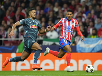 Benjamin Henrichs right-back of RB Leipzig and Germany and Samuel Lino left winger of Atletico de Madrid and Brazil compete for the ball dur...