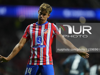 Marcos Llorente central midfield of Atletico de Madrid and Spain reacts during the UEFA Champions League 2024/25 League Phase MD1 match betw...