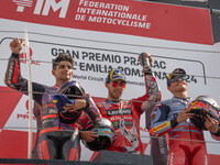 Enea Bastianini, Jorge Martin, and Marc Marquez participate in the Gran Premio Pramac dell'Emilia Romagna Grand Prix Race MotoGP on Sunday a...