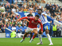 Morgan Gibbs-White of Nottingham Forest battles with Carlos Baleba of Brighton during the Premier League match between Brighton and Hove Alb...