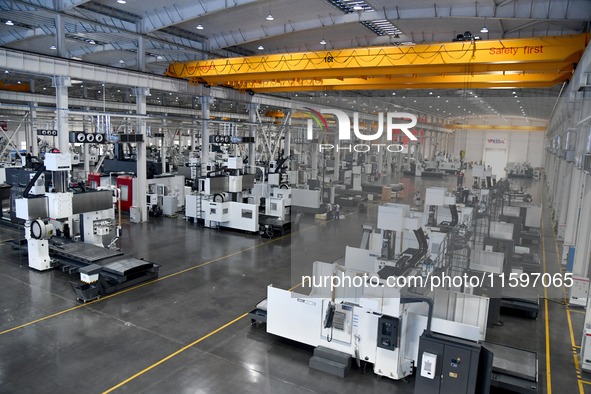 A CNC machine tool production workshop of Intelligent Equipment Corporation is seen in Zaozhuang, China, on September 21, 2024. 