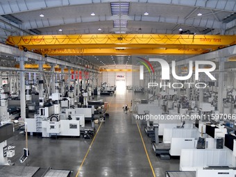 A CNC machine tool production workshop of Intelligent Equipment Corporation is seen in Zaozhuang, China, on September 21, 2024. (