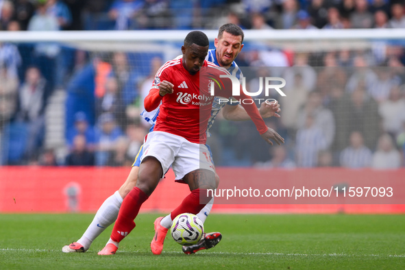 Callum Hudson-Odoi of Nottingham Forest is under pressure from Lewis Dunk of Brighton during the Premier League match between Brighton and H...