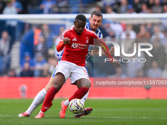 Callum Hudson-Odoi of Nottingham Forest is under pressure from Lewis Dunk of Brighton during the Premier League match between Brighton and H...