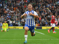 Jack Hinshelwood of Brighton celebrates after scoring a goal to make it 1-1 during the Premier League match between Brighton and Hove Albion...