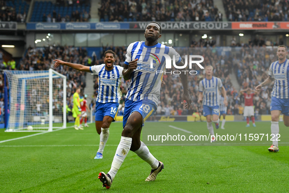 Danny Welbeck of Brighton celebrates after scoring a goal to make it 2-1 during the Premier League match between Brighton and Hove Albion an...