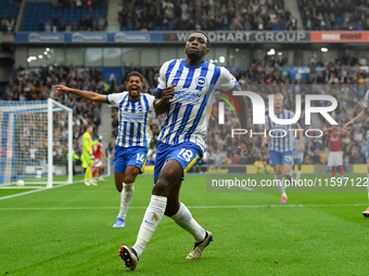 Danny Welbeck of Brighton celebrates after scoring a goal to make it 2-1 during the Premier League match between Brighton and Hove Albion an...