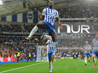 Danny Welbeck of Brighton celebrates after scoring a goal to make it 2-1 during the Premier League match between Brighton and Hove Albion an...