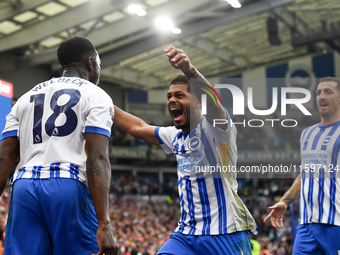 Georginio Rutter of Brighton celebrates after Danny Welbeck of Brighton scores a goal to make it 2-1 during the Premier League match between...