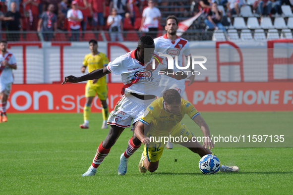 Davis Mensah of Mantova 1911 contrasts with Edoardo Masciangelo of AS Cittadella 1973 during the Italian Serie B soccer championship match b...