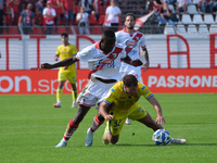 Davis Mensah of Mantova 1911 contrasts with Edoardo Masciangelo of AS Cittadella 1973 during the Italian Serie B soccer championship match b...