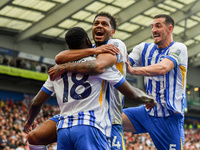 Georginio Rutter of Brighton and Lewis Dunk of Brighton celebrate after Danny Welbeck of Brighton scores a goal to make it 2-1 during the Pr...