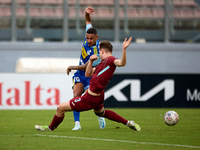 Stephen Pisani of Sliema Wanderers is challenged for the ball by Gabriel Bohrer Mentz of Gzira United during the Malta 360 Sports Premier Le...